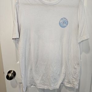 Travis Mathew White Tee with Light Blue Emblem